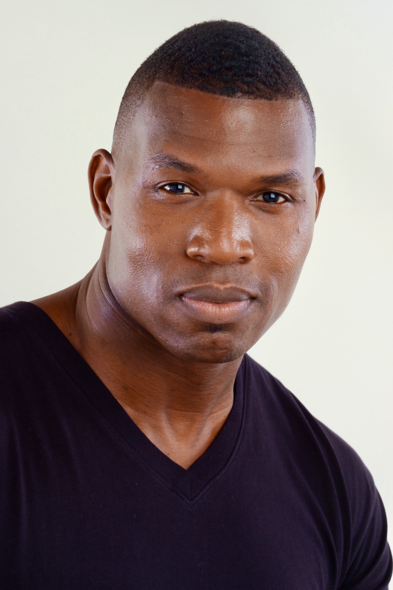 Lawrence Beamen studio headshot on a light backdrop